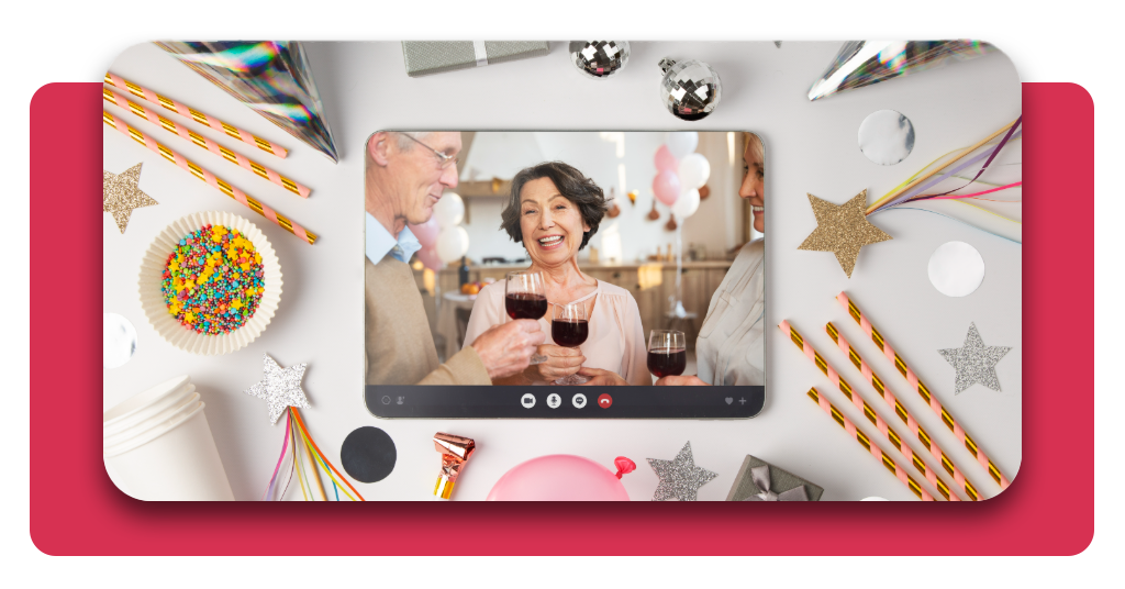 Crea invitaciones digitales interactivas gratis en minutos 3 Vista superior de la planificación y el diseño de una tarjeta digital interactiva en una pantalla, perfectamente rodeada de coloridas decoraciones de fiesta.